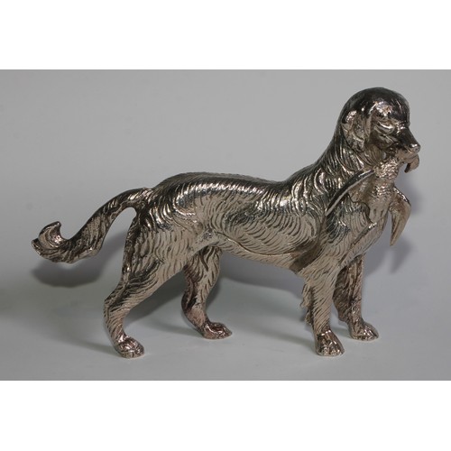 830 - A silver plated table decoration, cast as a gun dog holding a pheasant, 22cm long