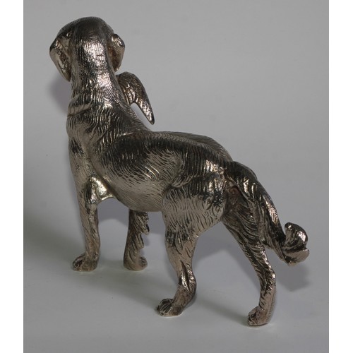 830 - A silver plated table decoration, cast as a gun dog holding a pheasant, 22cm long