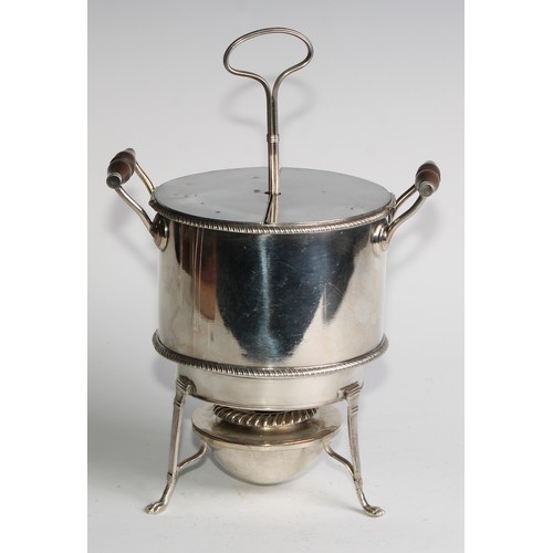 808 - A George III Old Sheffield Plate circular egg boiler, hinged twin-covers enclosing a four-section fr... 