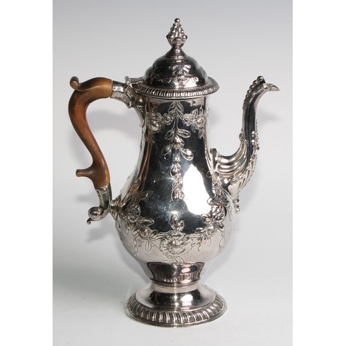 806 - A George III Old Sheffield Plate baluster coffee pot, chased with flowering leafy swags, hinged ogee... 