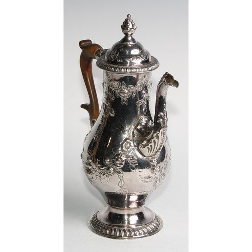 806 - A George III Old Sheffield Plate baluster coffee pot, chased with flowering leafy swags, hinged ogee... 