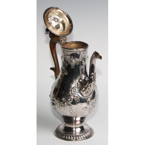 806 - A George III Old Sheffield Plate baluster coffee pot, chased with flowering leafy swags, hinged ogee... 