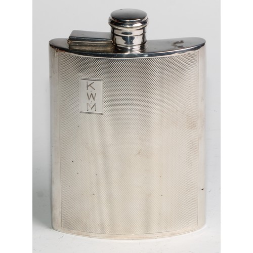 838 - An Art Deco E.P.N.S curved rounded rectangular hip flask, engine turned, hinged bayonet cover, 14cm ... 