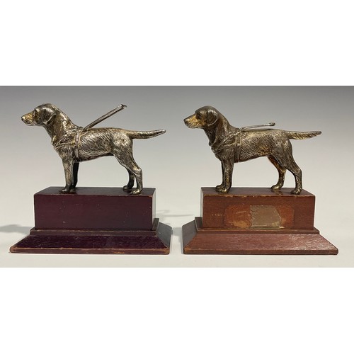 2095 - A pair of silvered models or car mascots, as dogs, by Louis Lejeune Ltd, mahogany plinths, 16cm high