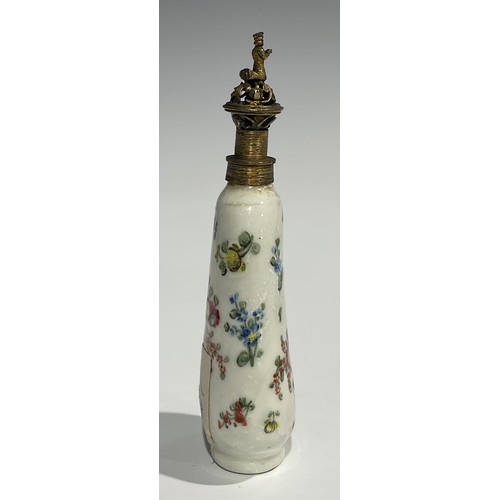 2271 - An 18th century Continental porcelain scent bottle, painted with flowers, reticulated gilt metal cov... 