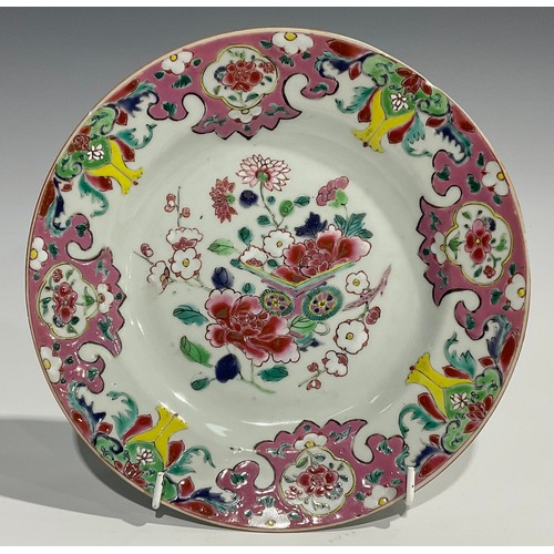 362 - A Chinese circular plate, decorated in polychrome enamels with chrysanthemums and blossoming prunus,... 