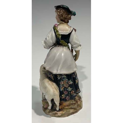 295 - A Meissen figure, of a musician, he sits playing the lute wearing long floral yellow coat, blue cros... 