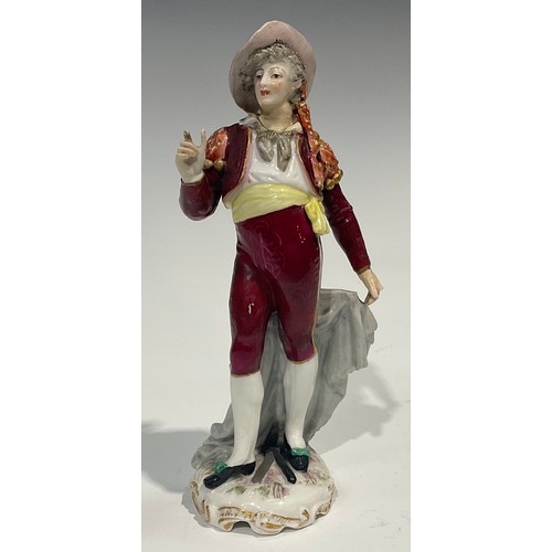 295 - A Meissen figure, of a musician, he sits playing the lute wearing long floral yellow coat, blue cros... 