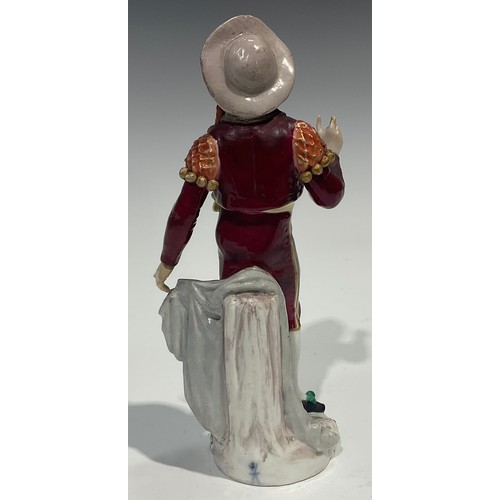 295 - A Meissen figure, of a musician, he sits playing the lute wearing long floral yellow coat, blue cros... 