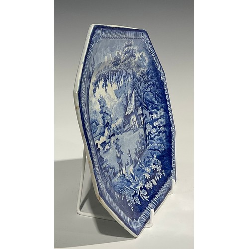 90 - A Brameld Rockingham canted rectangular plate, transfer printed in blue and white with Returning Woo... 