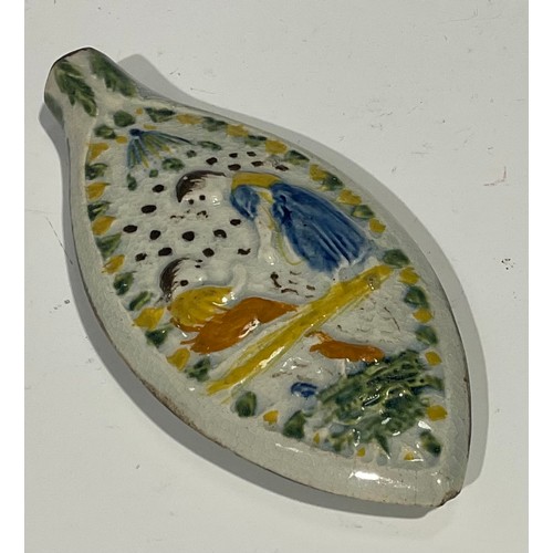 99 - A Staffordshire pastille burner, as a cottage, polychrome painted in blue and green, encrusted with ... 