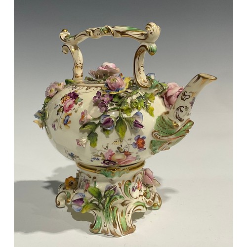 167 - A Coalbrookdale teapot and stand, painted with flowers and insects and profusely encrusted with flow... 