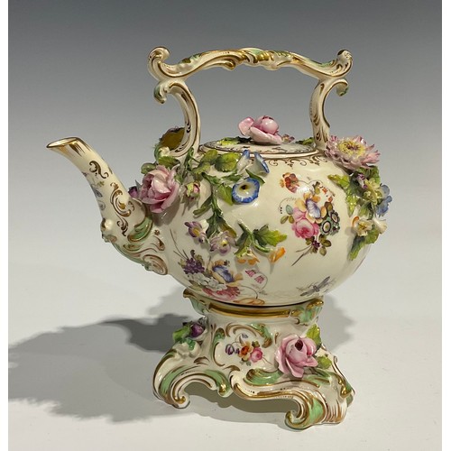 167 - A Coalbrookdale teapot and stand, painted with flowers and insects and profusely encrusted with flow... 