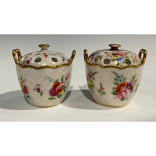 129 - A near pair of 19th century Spode violeteers or pot pourri vases and covers, painted with flowers on... 