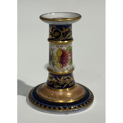 116 - A Charles Bourne miniature candlestick, the column painted with flowers, cobalt blue borders, applie... 