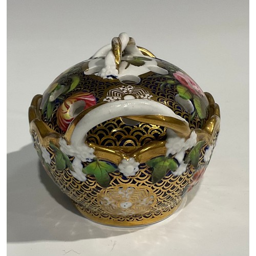 147 - A Spode basket shaped violeteer or pot pourri vase and cover, finely painted in coloured enamels wit... 