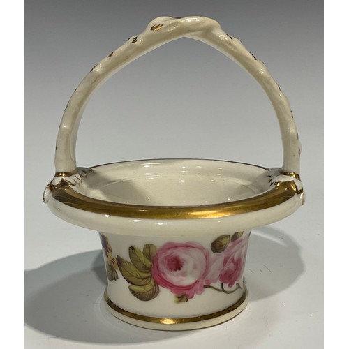 140 - A Rockingham pot pourri basket, with overhanging rim, painted with flowers, naturalistically moulded... 