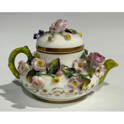 137 - A Rockingham miniature teapot, encrusted with flowers and foliage, gilt scrolling foliate band, natu... 