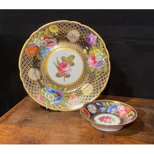 148 - A Spode circular plate, with circular cartouche painted with a pink rose, within a border painted wi... 