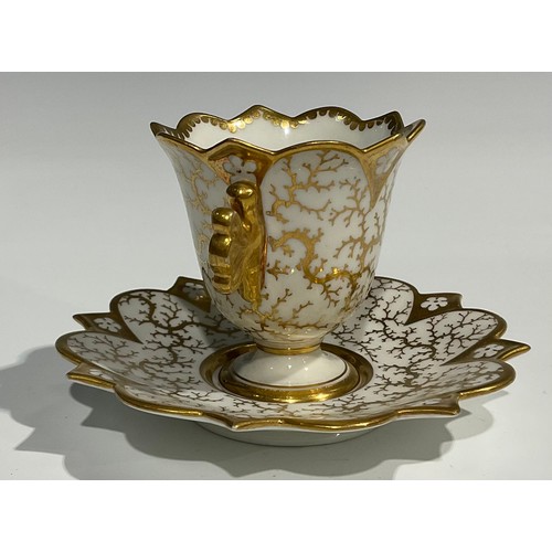 124 - A Flight, Barr & Barr cabinet cup and saucer, the cup painted with a gentleman traveller, with gilt ... 