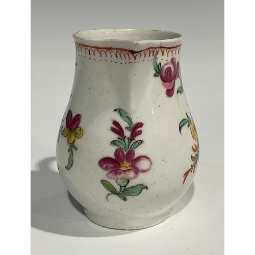 223 - A Worcester sparrow beak jug, decorated in polychrome, with stylised flowers and foliage, crows foot... 