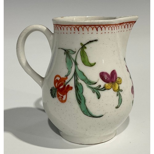 223 - A Worcester sparrow beak jug, decorated in polychrome, with stylised flowers and foliage, crows foot... 