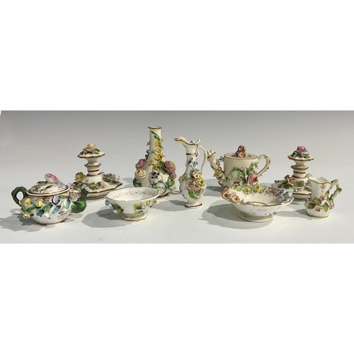 255 - A Spode miniature teapot, encrusted with flowers and foliage, picked out with gilt, naturalistically... 