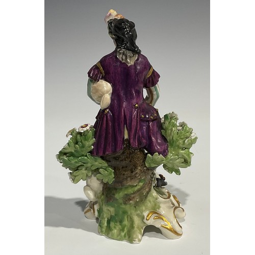 250 - A pair of Derby type figures, of musicians, both in fanciful dress, she with lute, a sheep at her fe... 