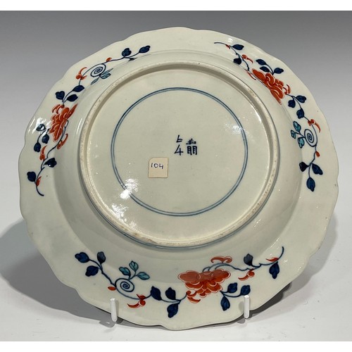 215 - A Worcester Old Japan Fan pattern teacup and saucer, painted in the Imari palette, picked out in gil... 