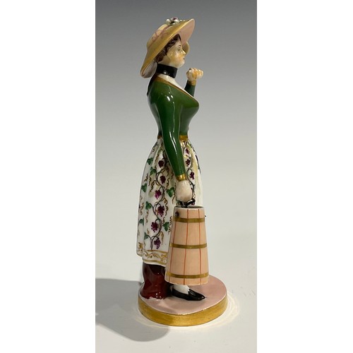 177 - A Chamberlains Worcester figure, of a milkmaid, she stands wearing a bonnet, green bodice and floral... 