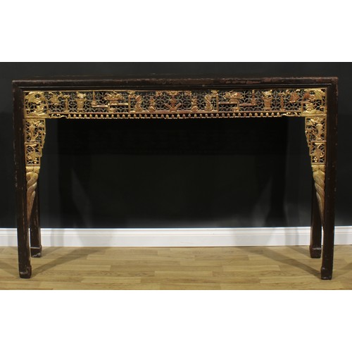 2035 - A Chinese painted softwood altar table, rectangular top above a giltwood apron pierced and carved wi... 