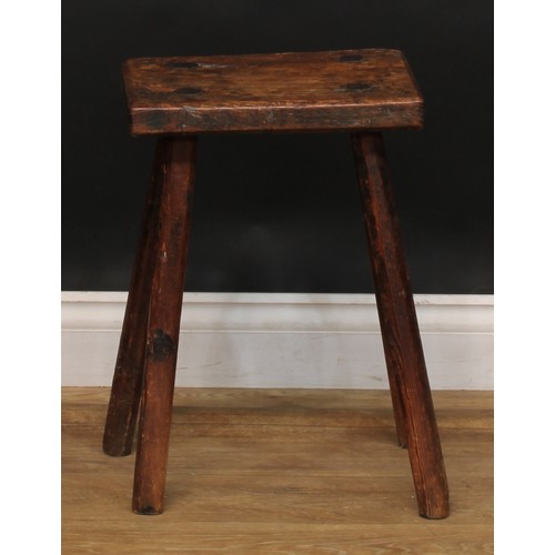 2053 - A late 18th/early 19th century elm cutler’s or craftsman’s stool, softwood legs, 48cm high, the top ... 