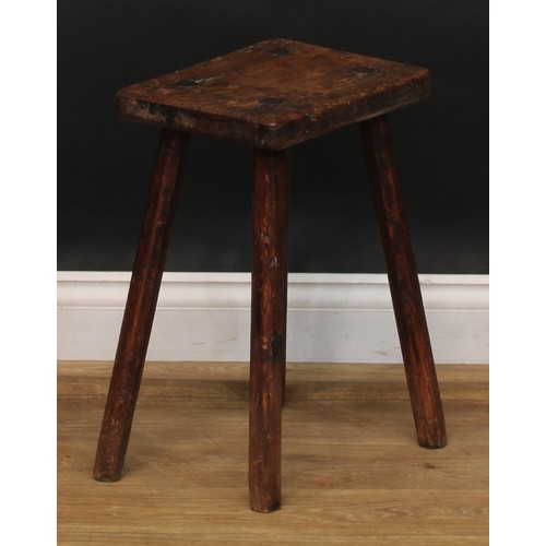 2053 - A late 18th/early 19th century elm cutler’s or craftsman’s stool, softwood legs, 48cm high, the top ... 