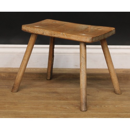 2053 - A late 18th/early 19th century elm cutler’s or craftsman’s stool, softwood legs, 48cm high, the top ... 