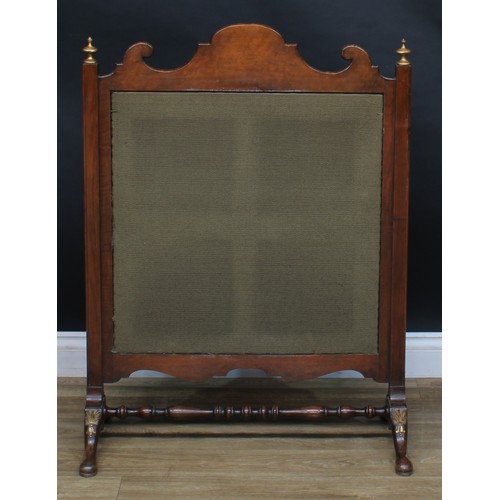 1729 - A George II inspired parcel-gilt mahogany fire screen, shaped cresting centred by a shell, woolwork ... 