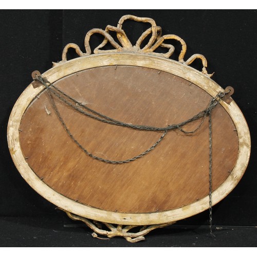 2432 - A 19th century oval giltwood and gesso pier glass, bevelled mirror plate, the frame applied with a r... 