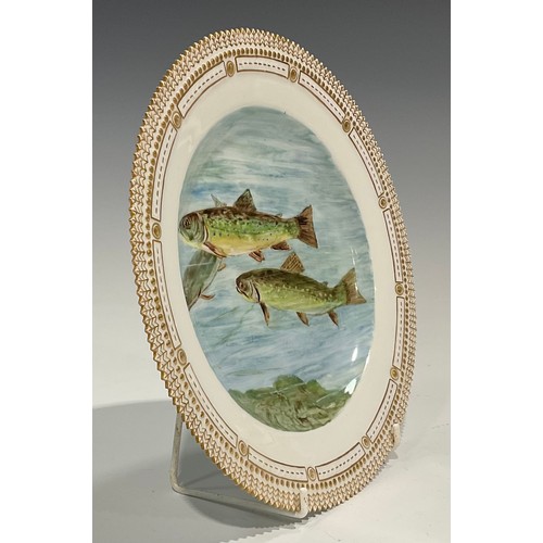 308 - A Royal Copenhagen plate, painted with Brook Trout, gilt serrated rim, 25.5cm diameter, underglaze b... 