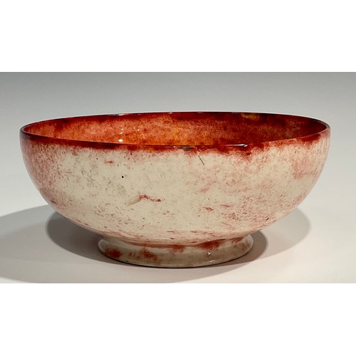 105 - A Moorcroft circular pedestal bowl, glazed in mottled iron red and yellow tones, 25cm diameter, impr... 