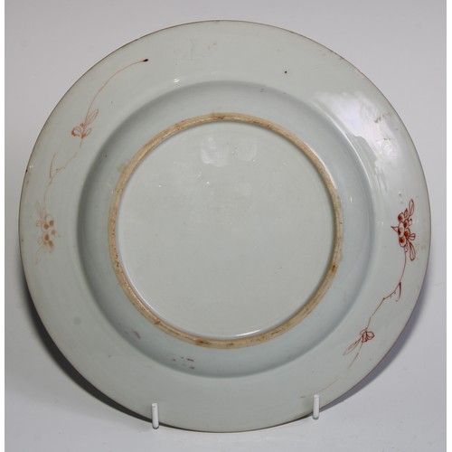 363 - A Chinese circular plate, painted in the famille rose and nor palette with flowers picked out in gil... 