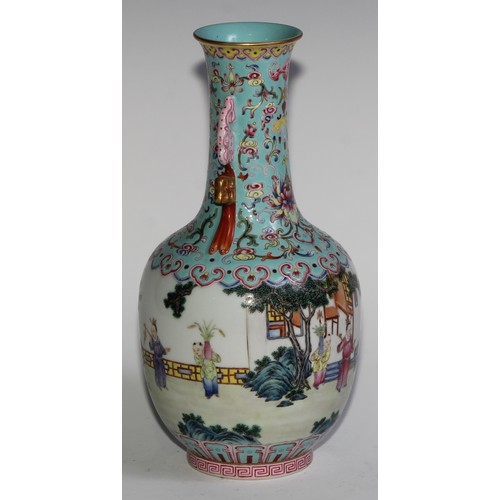 398 - A Chinese ovoid ovoid vase, painted in polychrome enamels with children at play outside a pagoda, th... 