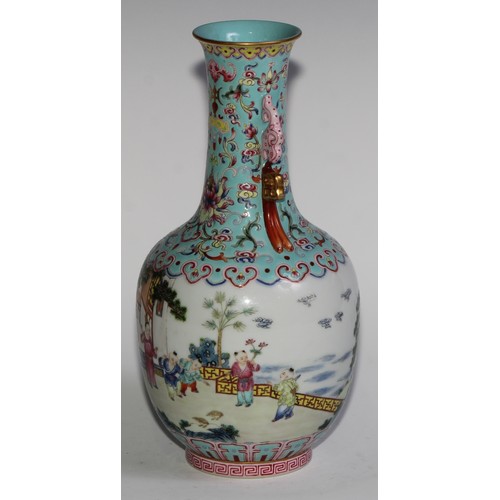 398 - A Chinese ovoid ovoid vase, painted in polychrome enamels with children at play outside a pagoda, th... 