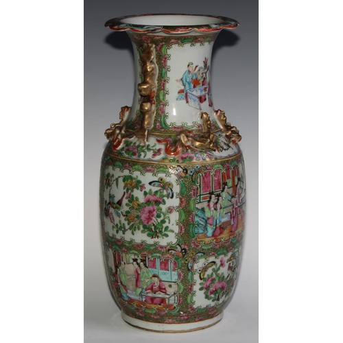 469 - A pair of Chinese famille rose ovoid vases, painted in the typical Cantonese manner with figures of ... 