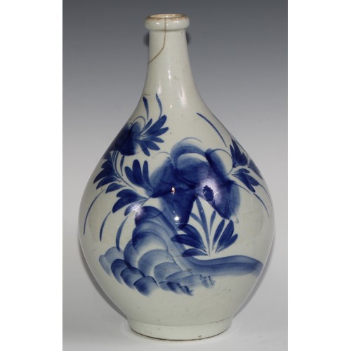 440 - A Korean ovoid vase, painted in tones of underglaze blue with flowers, 40cm high, 19th century