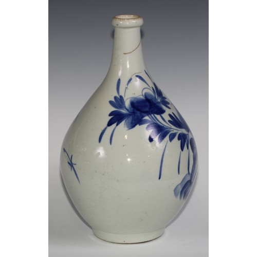 440 - A Korean ovoid vase, painted in tones of underglaze blue with flowers, 40cm high, 19th century