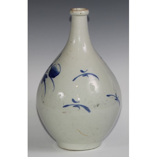 440 - A Korean ovoid vase, painted in tones of underglaze blue with flowers, 40cm high, 19th century