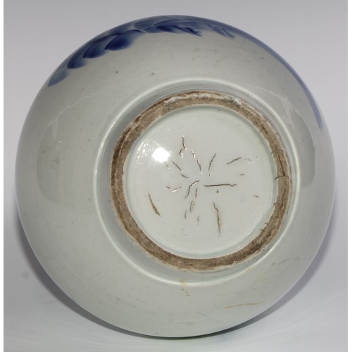 440 - A Korean ovoid vase, painted in tones of underglaze blue with flowers, 40cm high, 19th century