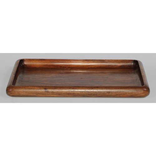 379 - A Chinese huanghuali rectangular tray, dished border, 35.5cm wide