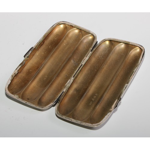 976 - A George V silver rounded rectangular three-section cigar case, bright-cut engraved with scrolling f... 