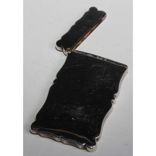 1176 - An Edwardian silver rounded rectangular visiting card case, embossed with scrolling leaves, hinged c... 