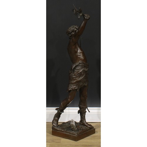 2707 - Eugène Marioton (1857-1933), French, a large brown patinated bronze, Vainqueur, an archer holding al... 